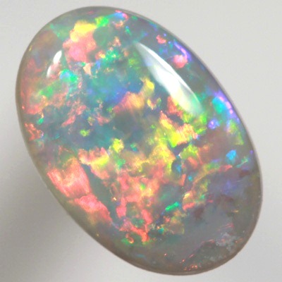 SOLID SEMI BLACK OPAL Gemmy red and gold over green and blue